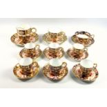 Set of 6 Royal Crown Derby Imari Pattern coffee and 6 saucers, mustache cup with saucer, (bears
