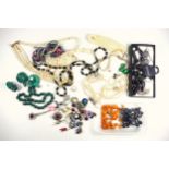 Butterscotch amber beads (41 grams), 3 malachite animals and a bead necklace, other necklaces and