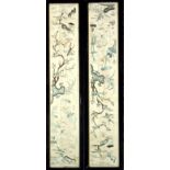 Pair of Chinese floral and bird embroidered silk marriage sleeves, 51 x 9.5cm, framed and glazed,