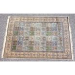Persian garden carpet, the multipanelled field with all-over stylised floral decoration within a