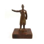 "British Bobby", pre-1914 bronze car mascot depicting a policeman pointing to his right, by