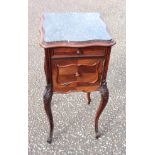 Louis XV style kingwood bedside cabinet with an inset shaped serpentine marble top, drawer and panel