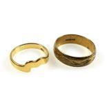 Yellow metal shaped ring stamped "750", 3.4grs and a 9ct gold ring, 4.2grs. (2)