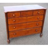 George IV mahogany chest, the inlaid front with 3 short, 3 graduated long drawers, flanked by reeded