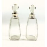 Pair of George V Art Deco glass decanters, each of tapering square form with canted corners,