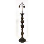 An Eastern bronzed brass table lamp with an adjustable double bulb holder, H.91cm overall