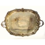 Large silver plated tray of rounded rectangular form with engraved foliate C-scroll decoration and