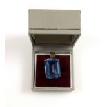 Yellow metal pendant set emerald cut synthetic spinel, 22 x 16mm, stamped 9ct, 10grs, cased. (2)