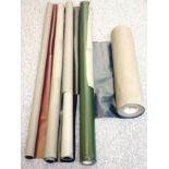 4 long rolls of bookbinding leatherette, and a short roll, various colours and quantities. (5)