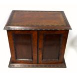Fine Victorian inlaid rosewood and walnut compendium with 2 panelled doors disclosing 9 small