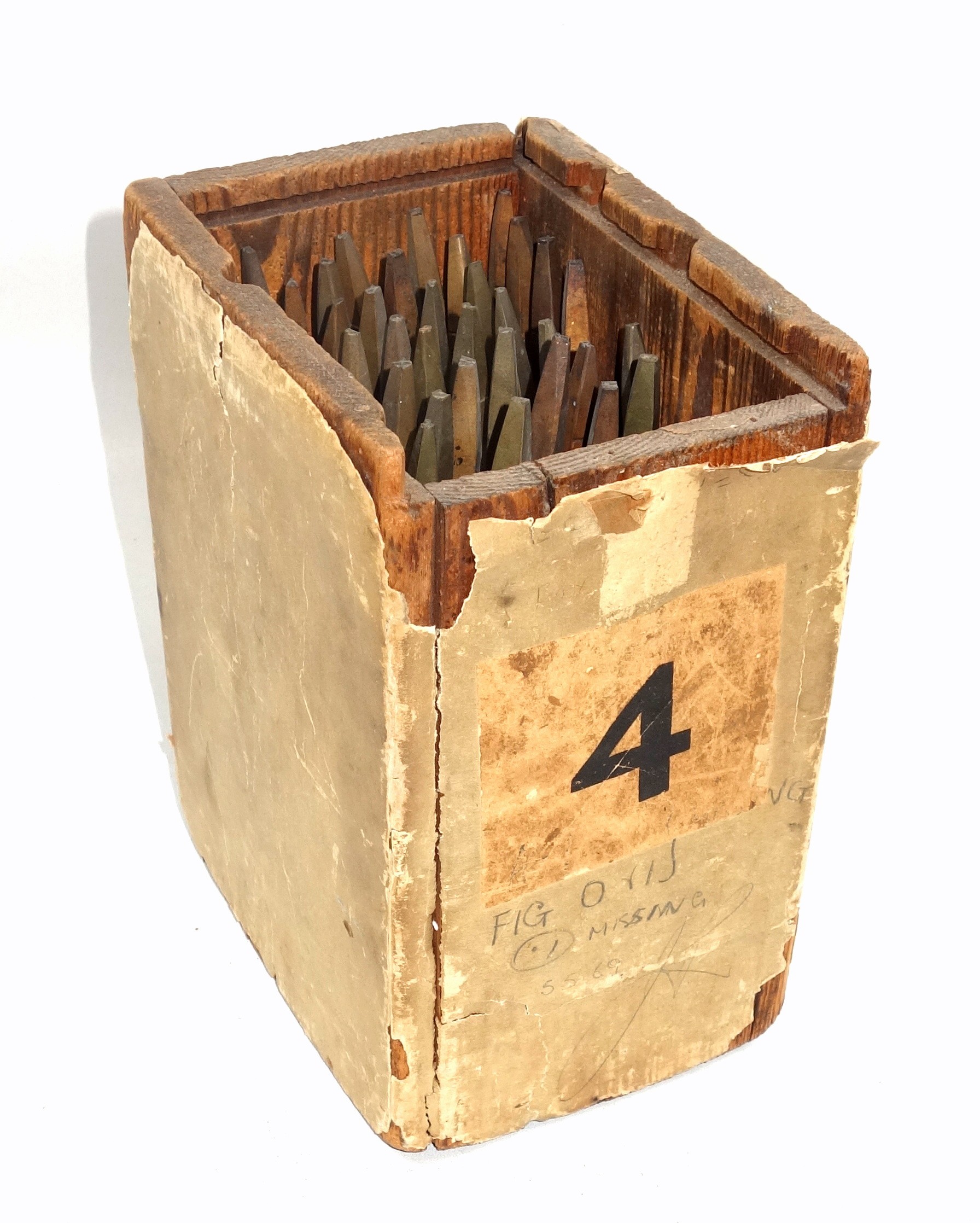 Wooden box containing 36 gold finishing hand tools comprising incomplete alphabet, (missing I),