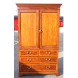 Edwardian inlaid mahogany linen press with a dentil cornice, the satinwood banded front with 2