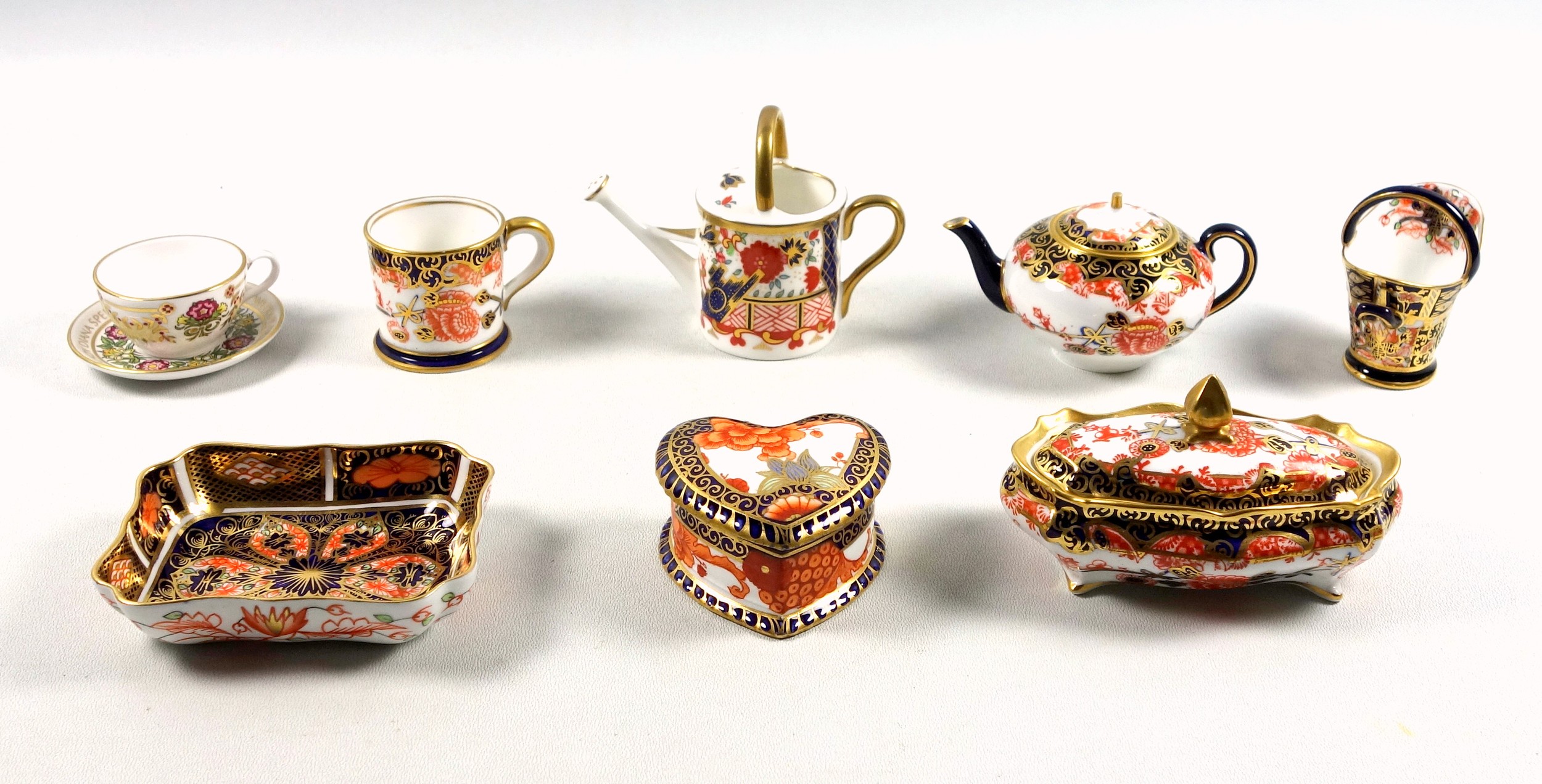 Royal Crown Derby Imari pattern miniature items including 2 covered boxes, teapot, watering can, 3