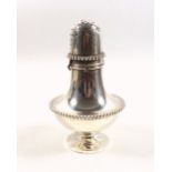 American white metal baluster caster with beaded bands, monogram "AR", and a pierced domed bayonet