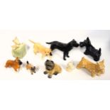 Sylvac, Beswick, and other figures of various breeds of dogs, largest W.24cm. (9)