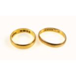 22ct gold wedding ring by W W Ltd., London, 1958, and a 22ct oval ring, London, 1920, 6.9grs. (2)