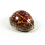 Irish Georgian silver mounted cowrie shell snuff box, the hinged cover inset with pink agate