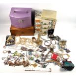 Necklaces, brooches, bracelets and other costume jewellery in 2 jewel boxes, and 2 other boxes, etc.