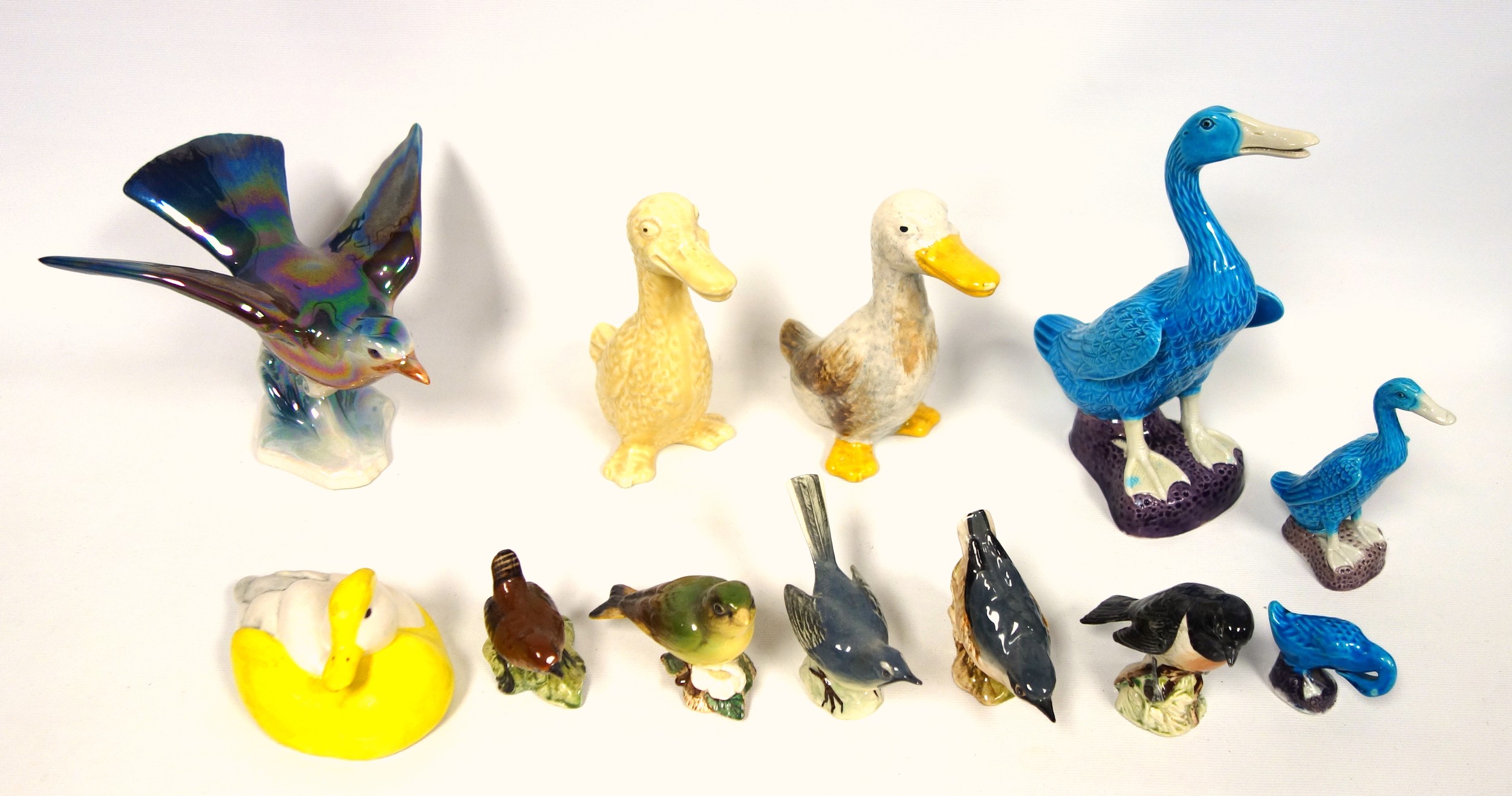 Beswick and other figures of birds, various, largest H.20.5cm. (12)