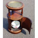 Victorian cylindrical mahogany washstand with a later loose brass top, on cylindrical columns with