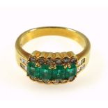 Yellow metal ring set 4 pale green stones and 20 diamonds, stamped "18k 750", 5.3grs