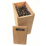 Wooden box containing 40 gold finishing hand tools comprising complete alphabet, numbers 0-9,