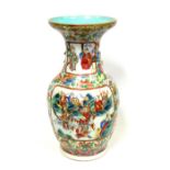 19th century Chinese Canton baluster vase decorated in polychrome enamels with central reserves of