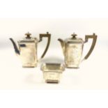 George VI silver 3 piece coffee set comprising coffee pot, hot milk jug, and sugar bowl, of canted