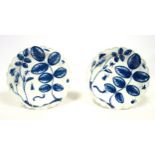 Pair of Worcester First Period circular plates, each with painted blue and white rose buds,