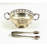 Edwardian silver circular bowl with pierced square and canted rectangular decoration, 2 twin