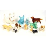 Sylvac, Beswick, Price, and other figures of various breeds of dogs, largest W.24cm. (12)