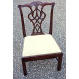 Child's Chippendale style mahogany chair, with a carved and pierced splat arched back and drop in