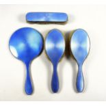 Edward VIII silver and blue guilloche enamel dressing table set comprising a hand mirror, pair of