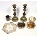 Pair of 19th century Old Sheffield plated candlesticks, each with a floral embossed column, on a