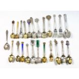 11 silver and enamel souvenir spoons, 8 foreign white metal spoons, 3 Danish enamel spoons and a