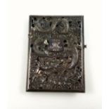 Early 20th Century Chinese silver card case, pieced, chased, and embossed with celestial dragons