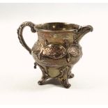 Victorian silver baluster jug with chased and embossed lattice and foliate decoration, scroll
