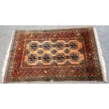 A rust brown Bokhara rug, 200.5cm x 124.5cm, a/f