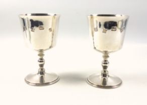 Pair of silver goblets with a bucket bowl and knopped baluster stem, on a circular foot, by Barker