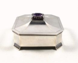 Swedish silver canted square dressing table box with a cover set with an amethyst, 21 x 16mm, on 4