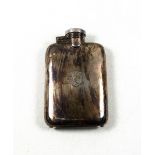 Indian silver hip flask of curved rounded rectangular form, with a hinged twist-locking bayonet