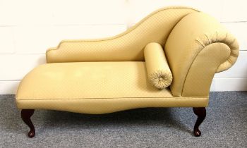 Victorian style small chaise longue upholstered in latticed gold fabric, on cabriole legs, 74 x