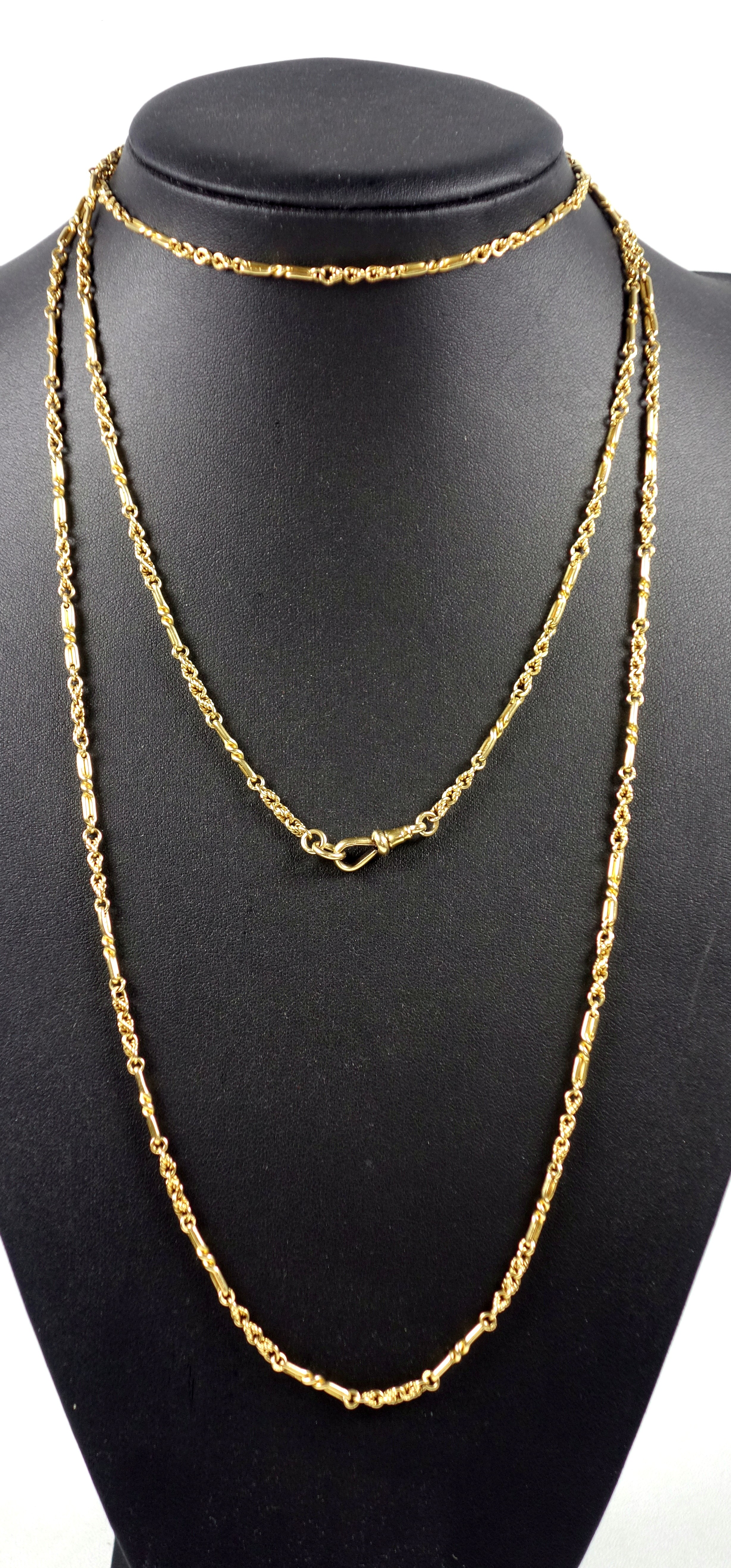 Victorian 18ct gold guard chain with fancy bar and twist links and "dog collar" clasp, L.150cm, 63.