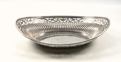 Victorian silver bread basket, of navette form, the reeded body with a floral pierced and bright-cut