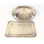 Indian white metal oval presentation salver, with a gadrooned and floral rim, marked "Silver",