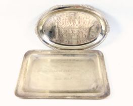 Indian white metal oval presentation salver, with a gadrooned and floral rim, marked "Silver",