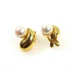 Pair of foreign yellow metal and pearl ear clips, stamped "750", 4.3grs, in a silk purse. (3)