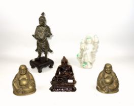 Carved "tiger's eye" figure of a seated buddha, H.11.5cm, (chip to base); white jade figure of