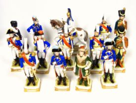German porcelain soldier on horseback decorated in bright colours, H.29.5cm, (a/f), and 17 figures