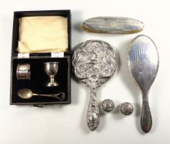 Silver christening set, comprising spoon, egg cup and napkin ring, by Lanson Ltd., Birmingham